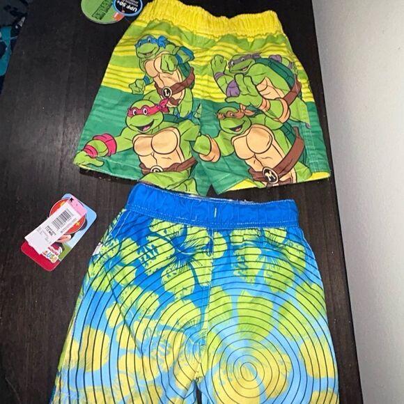 Set of 2 NWT swimming trunks size 12 months - Picture 2 of 8